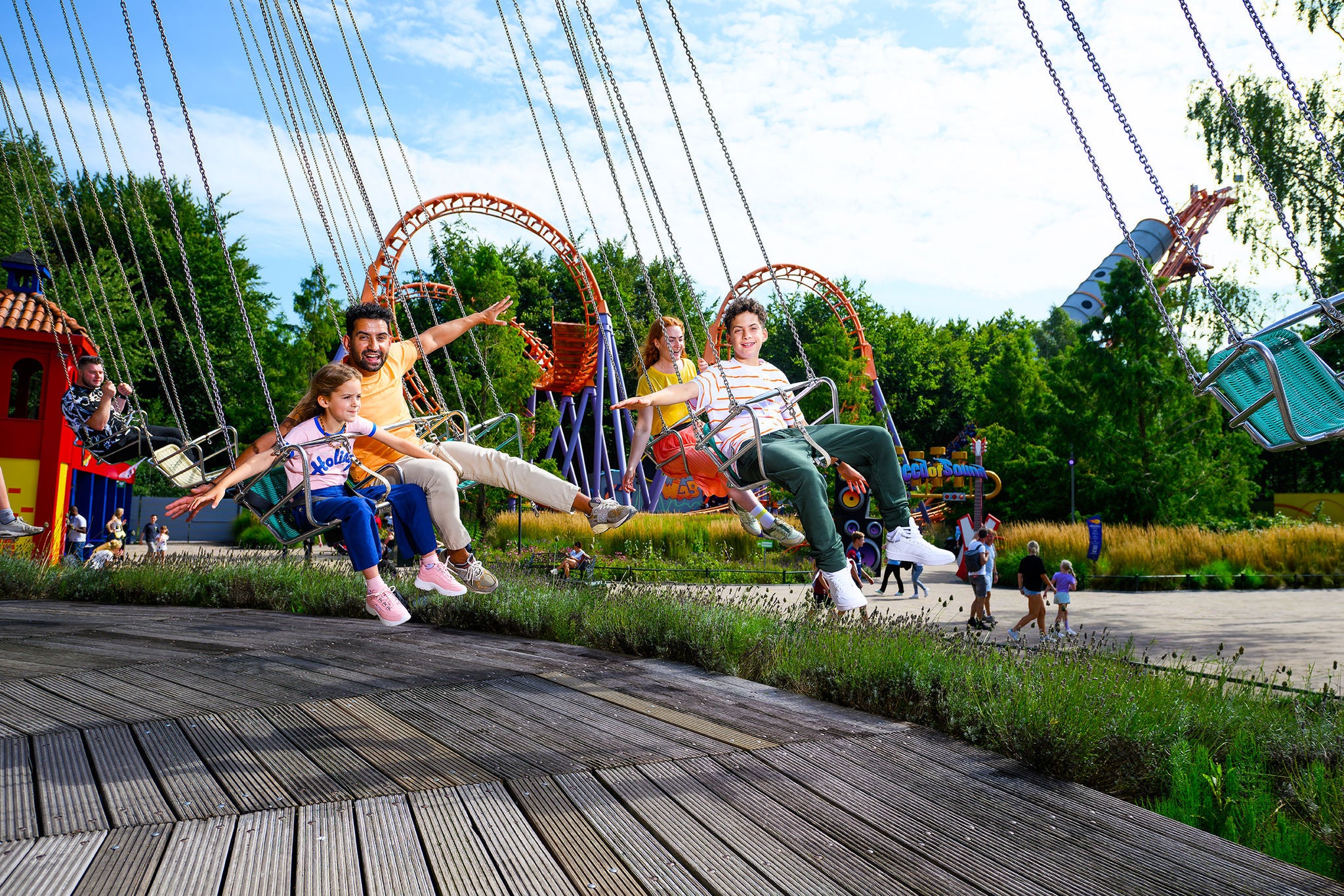 Spin around together in the Super Swing carousel.